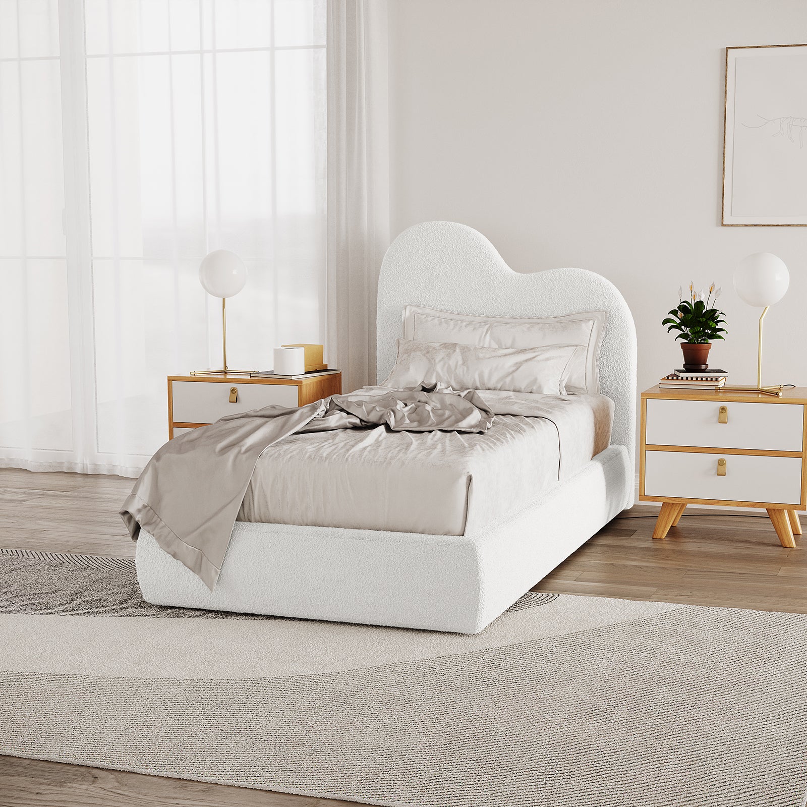 Thales Single Curved Boucle Fabric Bed Frame in Cream White, showcasing a cloud-like headboard. Features neutral silky bedding, mid-century nightstands, brass lamps, and a textured area rug in a minimalist bedroom setting.