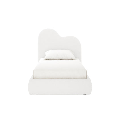 Thales Single Curved Boucle Fabric Bed Frame in Cream White featuring an abstract, cloud-like headboard, low cushioned platform, and neatly made mattress with a fitted sheet and pillow.