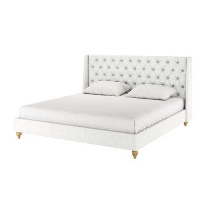 Vilania Tufted Fabric Bed Frame - King - Off White featuring a tufted wing-back headboard, short turned wooden legs, and a clean, contemporary design with two white pillows on the mattress.