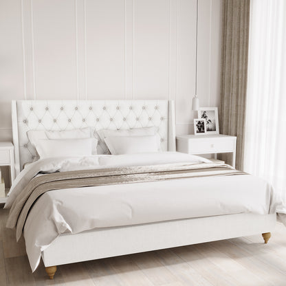 Vilania Tufted Fabric Bed Frame - King - Off White features a tall, tufted headboard in a serene bedroom with white linens, a neutral throw, and matching white bedside tables.