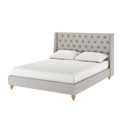 Vilania Tufted Fabric Bed Frame - Queen - Grey features a plush tufted headboard and solid wood construction, shown with a white pillow on a neatly made bed.