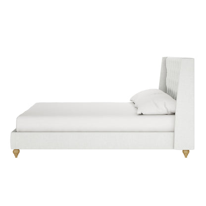 Vilania Tufted Fabric Bed Frame in Queen size showcases a side-profile of its off-white tufted headboard with wing-style sides, resting on low, turned wooden legs, featuring a sophisticated, modern design.