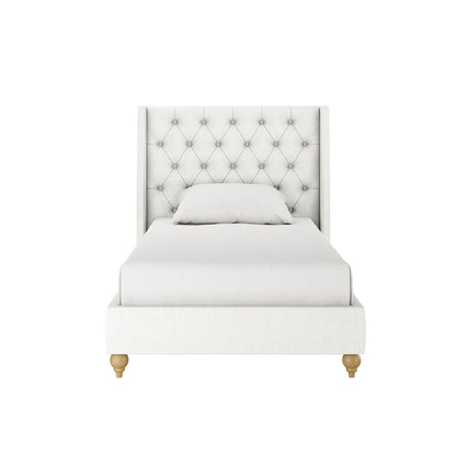 Vilania Tufted Fabric Bed Frame - Single - Off White features a close-up of the tufted headboard and white upholstery, highlighting the minimalist design with a white pillow resting on the bed.