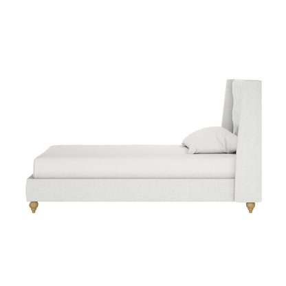 Vilania Tufted Fabric Bed Frame - Single - Off White, featuring a tufted headboard and low-profile design, displayed with a white pillow on a chair, highlighting its minimalist elegance and upholstery texture.