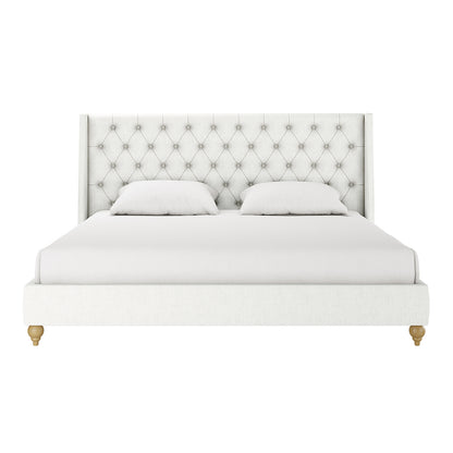 Vilania Tufted Fabric Bed Frame - Super King - Off White features a diamond-patterned, button-tufted headboard with winged sides, matching pillows, and a low-profile upholstered frame on natural wooden legs.