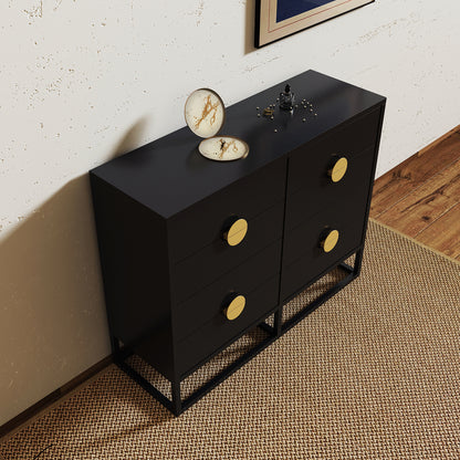 Abigail 120cm Lowboy Dresser with Gold Handle - Black features six drawers with brass pulls, on a metal frame, topped with a marbled box, dark bottle, and scattered jewelry.