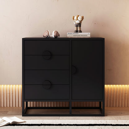 Abigail 100cm Sideboard Buffet Table - Black with matte-black finish, featuring drawers and a cabinet. Topped with rose-gold headphones, Russian books, and a collectible toy, set against a textured plaster wall.