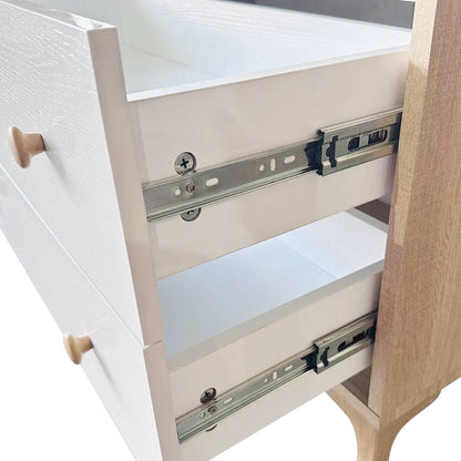 Close-up of Afra 80cm Buffet Cabinet with Glass Doors in White & Natural, highlighting exposed side-mount metal drawer slides, screws, and wooden frame, emphasizing sturdy construction and elegant design features.