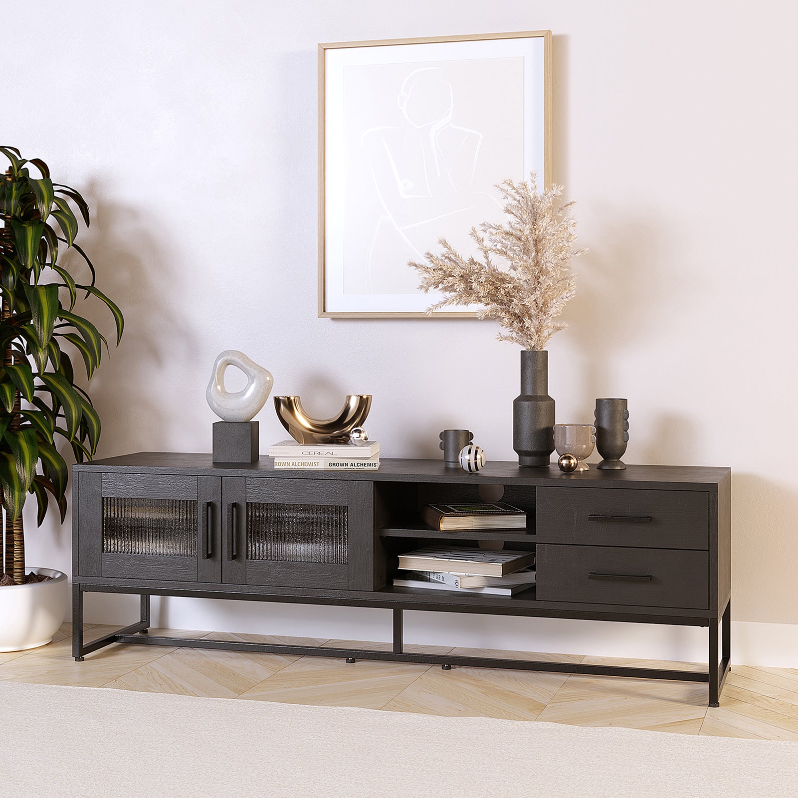 Ashley 160cm TV Unit with Fluted Glass Door Black features glass-paneled doors, open cubbies, and drawers. Styled with decorative items, it showcases sleek design elements and functional storage options.
