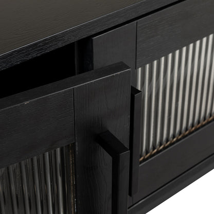 Ashley 160cm TV Unit with Fluted Glass Door Black, featuring a modern design with matte-black stained wood, vertically fluted glass panel, and a rectangular pull-handle on a slightly ajar door.
