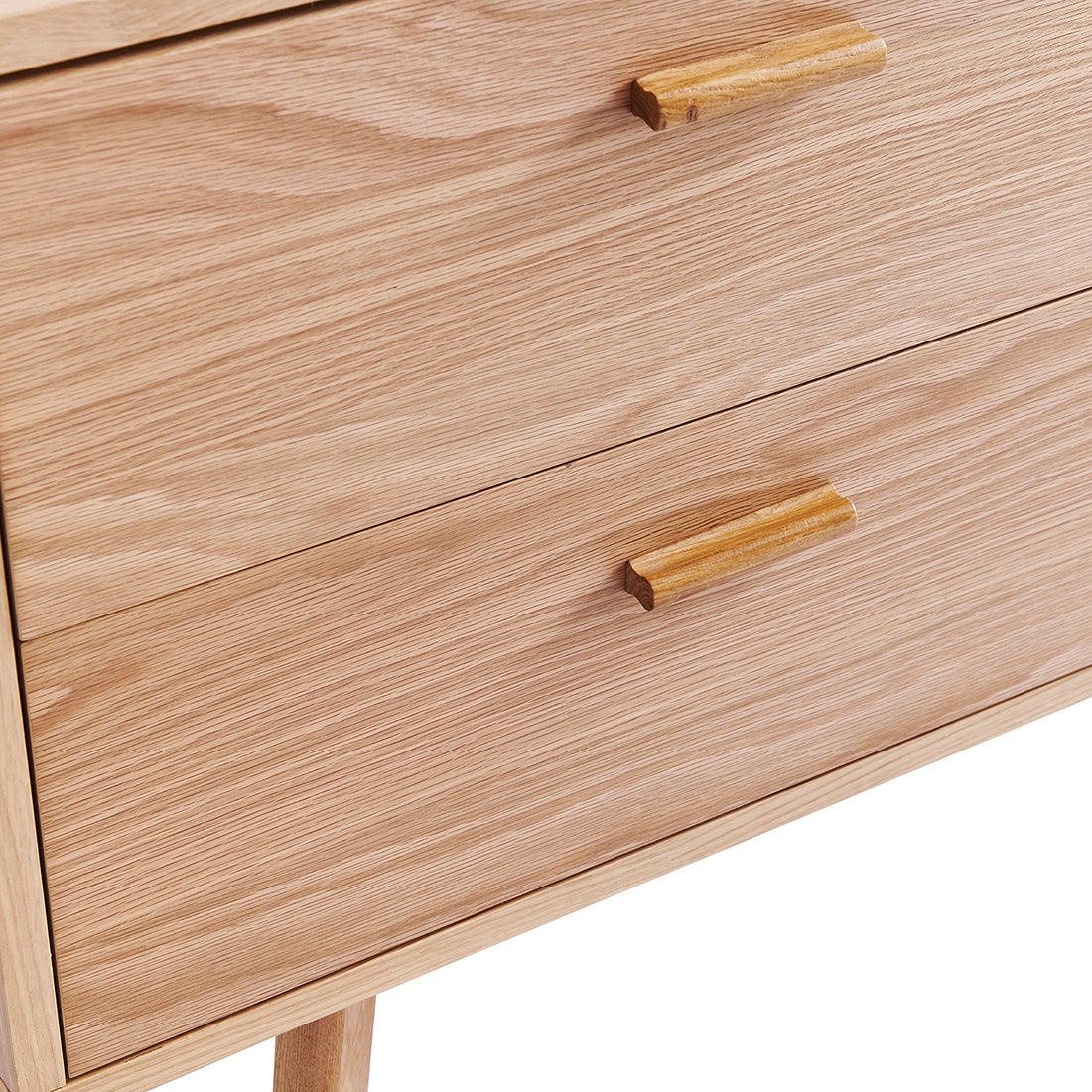 Close-up of Bethany 120cm Sideboard with Drawers Natural, showcasing light-oak wood front, two drawers with matching wooden bar handles, and a glimpse of a tapered leg, highlighting minimalist design.