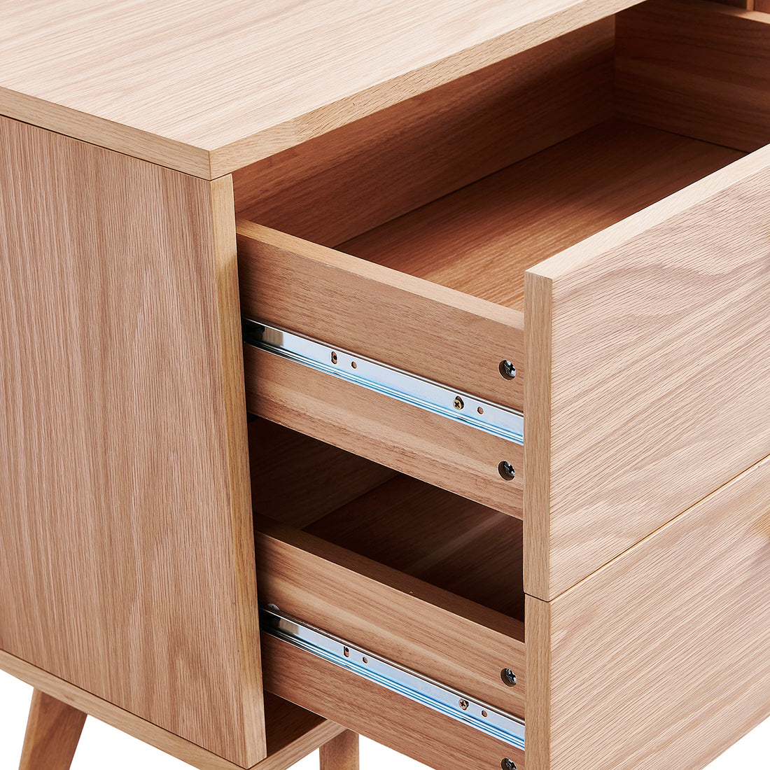 Bethany 120cm Sideboard with Drawers Natural, featuring a light-oak wood finish, two drawers partially open showing metal slides, and minimalist oak handles, exemplifying sleek, functional design.