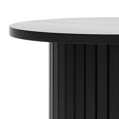 Booker 50cm Round Fluted Oak Side Table in Black, featuring a matte black round tabletop on a fluted cylindrical base, showcasing modern elegance and timeless charm in a minimalist design.