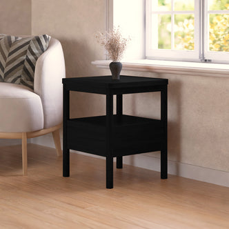 Brett Solid Oak Bedside Table - Black featuring a sleek, modern design with a spacious drawer and open shelf, crafted from solid oak for durability, shown in a close-up indoor setting.