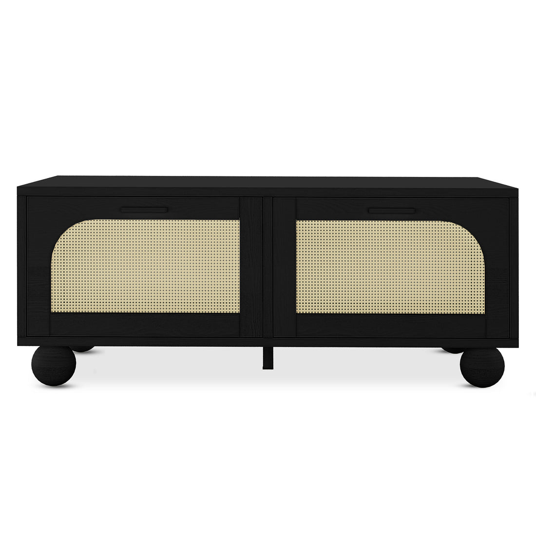 Carlo 110cm Rattan Coffee Table with Storage in Black features a matte black finish, sliding doors with semi-circular natural cane panels, and round feet. Ideal for storing essentials stylishly.