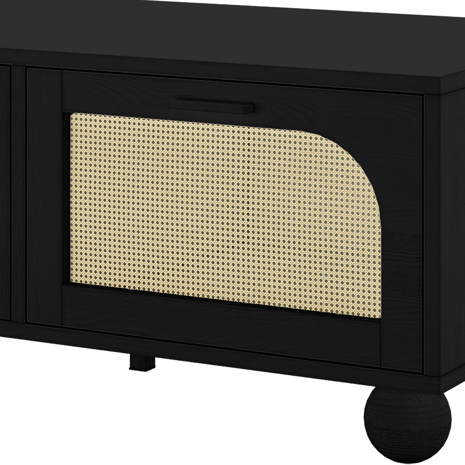 Carlo 110cm Rattan Coffee Table with Storage in Black features a black-stained wood cabinet with arched rattan screen, rectangular handle, and short bun feet, offering stylish storage functionality.