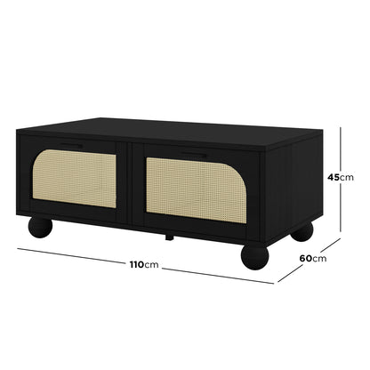 Carlo 110cm Rattan Coffee Table with Storage in Black, featuring two front doors with woven rattan panels and round ball-shaped feet, measures 110 cm wide, 60 cm deep, and 45 cm tall.