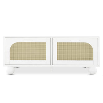 Carlo 110cm Rattan Coffee Table with Storage in White, featuring a sleek white frame, two rattan mesh front panels, and rounded ball feet, offering a modern, airy design with practical storage.