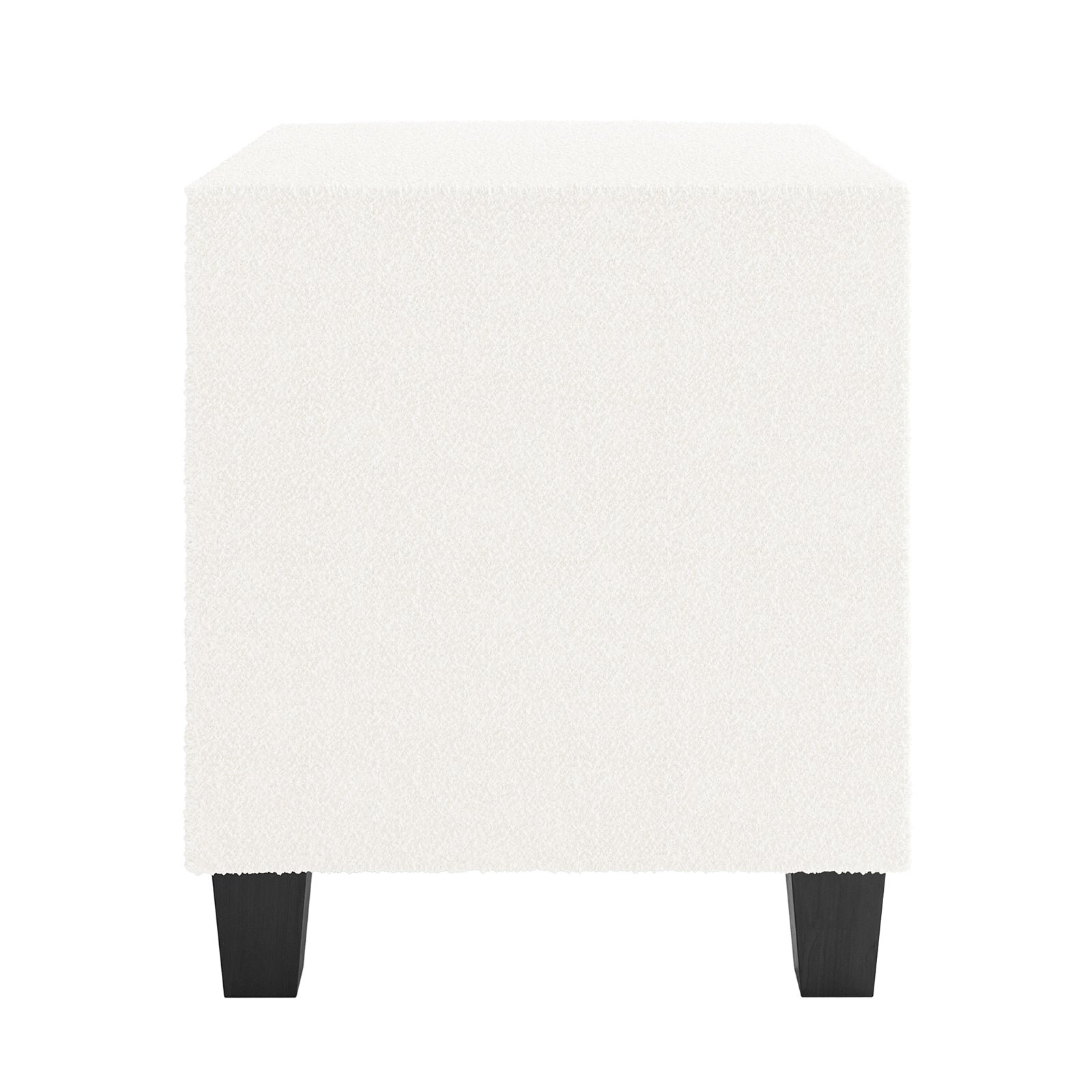 Crossandra 2 Drawer Fabric Bedside Table in Cream White, cube-shaped, upholstered in soft bouclé fabric, with four short, dark tapered legs, offering a chic and practical addition to any bedroom.