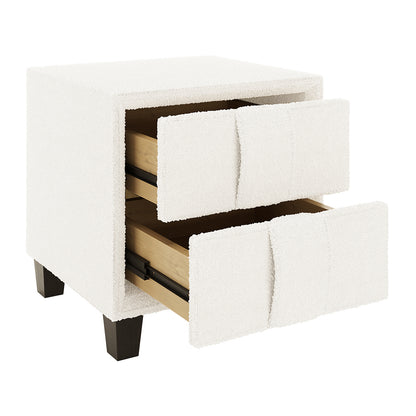 Crossandra 2 Drawer Fabric Bedside Table in Cream White, upholstered in textured off-white fabric, features two drawers with natural wood interiors and dark-stained legs, offering modern elegance and functionality.
