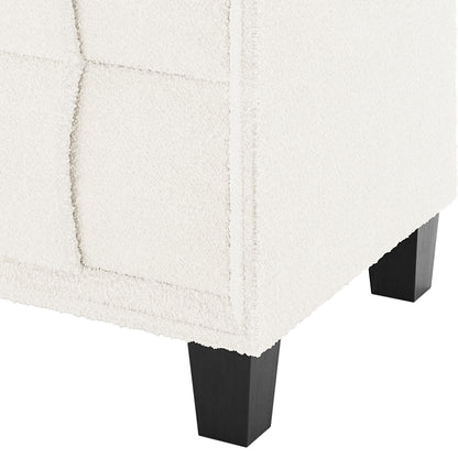 Close-up of the Crossandra Boucle Bedside Table in Cream White, showcasing textured boucle fabric and dark wooden legs, highlighting its elegant and modern design.
