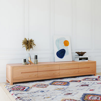 Declan 200cm American Oak Timber Entertainment Unit Natural, featuring a sleek design with four spacious drawers, perfect for organizing media essentials, showcased in an elegant indoor setting with complementary decor elements.