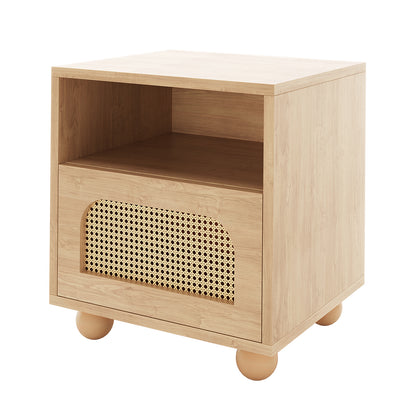 Dialga 45cm Rattan Bedside Table with Storage in Black, featuring a minimalist design with an open shelf, woven cane front panel, and round wooden feet for a modern bedroom touch.