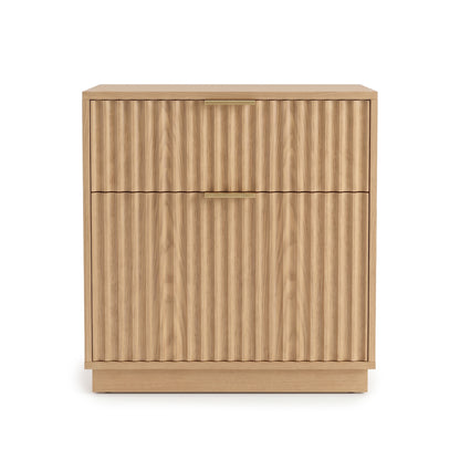 Wooden storage cabinet with ribbed fronts and minimal metal handles on a white background