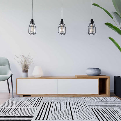 Eloise Entertainment Unit with Shelves – White, showcasing adjustable open shelves and push-to-open doors, designed for storing and organizing various items in a modern living room setting.