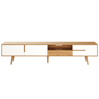 Estella 200cm American Oak Entertainment Unit in Natural featuring a long wooden cabinet with tapered legs, two white-fronted doors, central open shelf, and two white-fronted drawers for versatile storage.