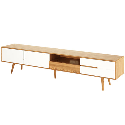 Estella 200cm American Oak Entertainment Unit in Natural features a mid-century design with white-fronted cabinet doors, drawers, an open cubby, and tapered legs, showcasing elegance and practical storage.