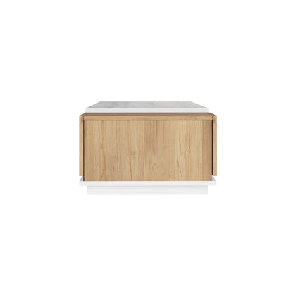Freda 120cm Coffee Table with Storage in White & Natural, showcasing a cube shape with light wood panels, a white top, and base. Features a swing-door cabinet and drawer for stylish storage.