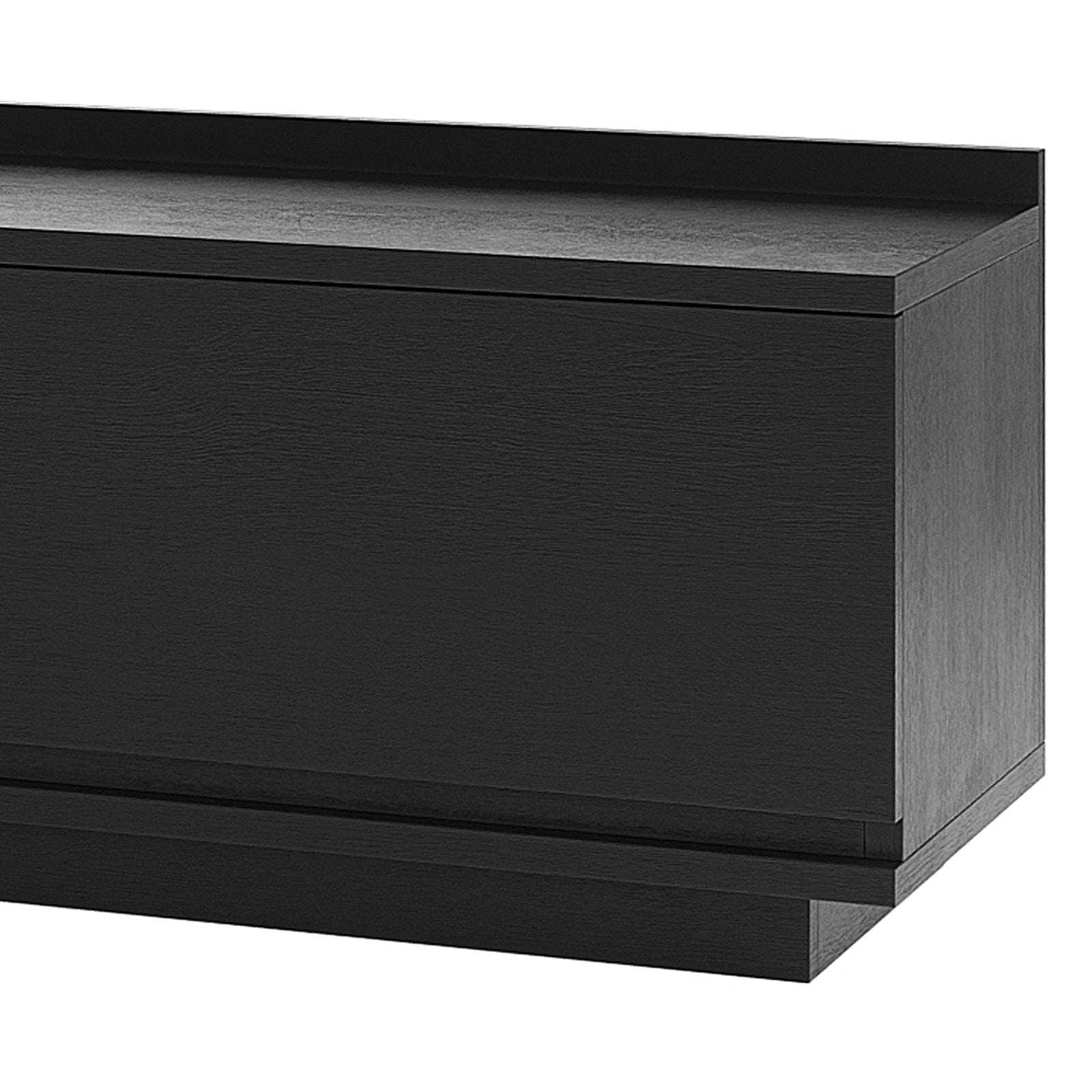 Close-up of the Freda 280cm Modular Entertainment TV Unit in Black & Natural, showcasing its handle-less, angular design with visible storage compartments, highlighting its sleek, modern black wooden construction.