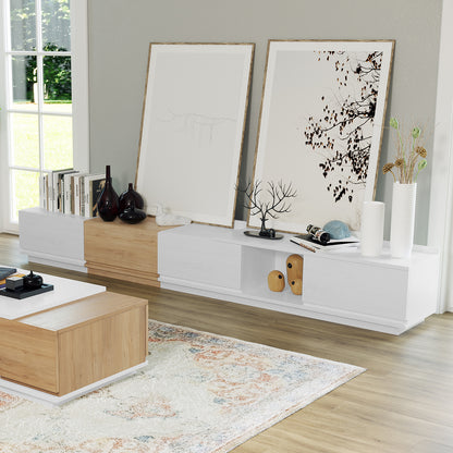 Freda 280cm Modular Entertainment Unit in white and natural tones, featuring wall-mounted cabinets adorned with decorative objects, art prints, and storage solutions, perfectly complementing a contemporary living space.