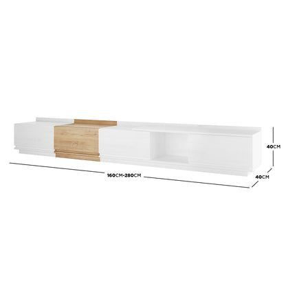 Freda 280cm Modular Entertainment TV Unit in White & Natural, featuring adjustable width, sliding doors, and open cubby, blending white and natural wood tones for a sleek, modern appearance.