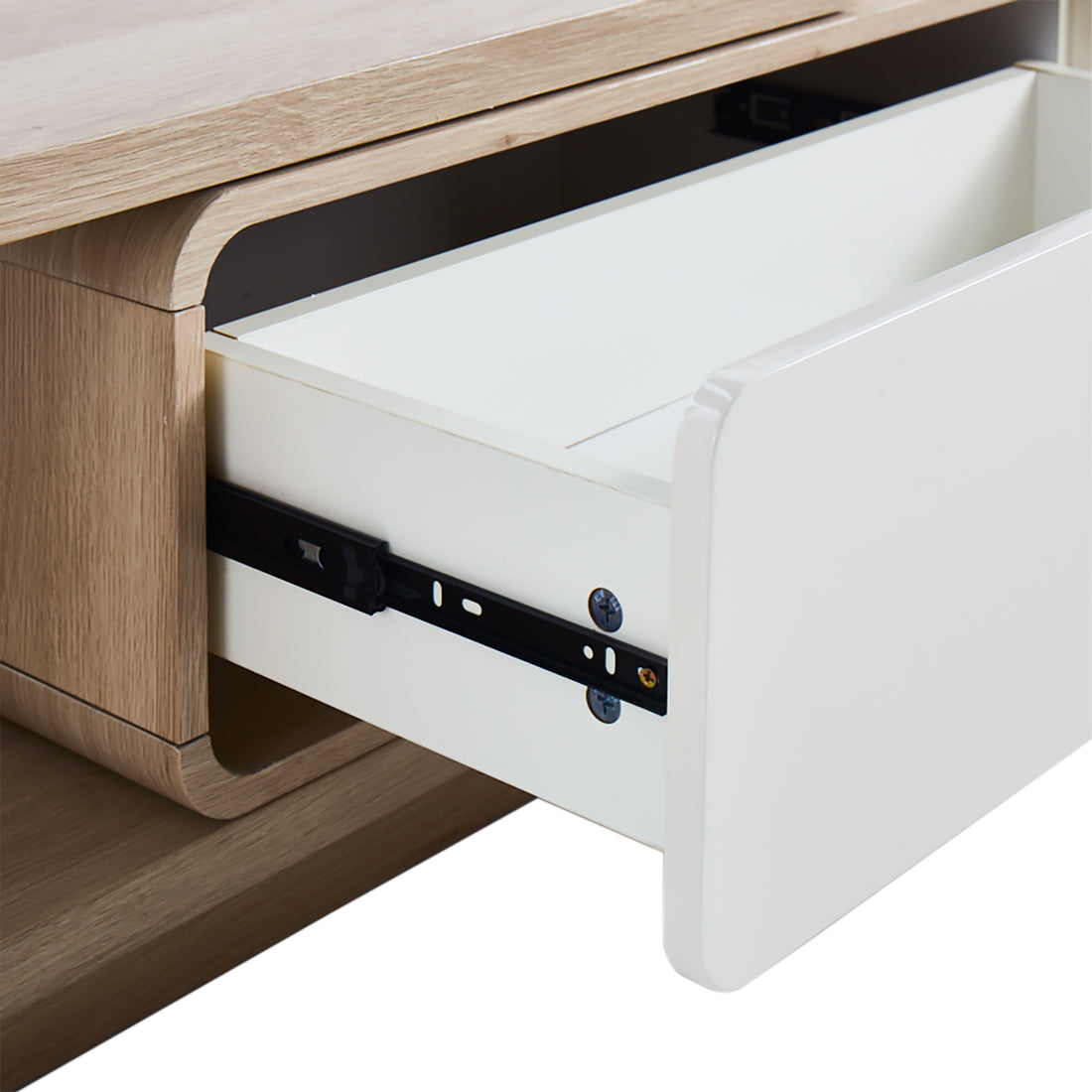 Galya Extendable Storage TV Unit - Oak with a glossy white drawer front, natural oak-tone wood case, and visible black metal side-mount drawer slides, showcasing its sleek and functional design.