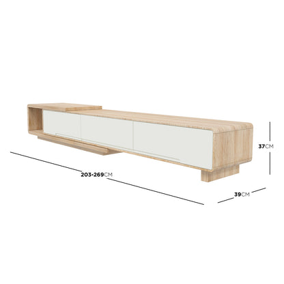 Galya Extendable Storage TV Unit - Oak, featuring a light wood finish, three white-fronted cabinet doors, an open shelving module, and adjustable length from 203 cm to 269 cm.
