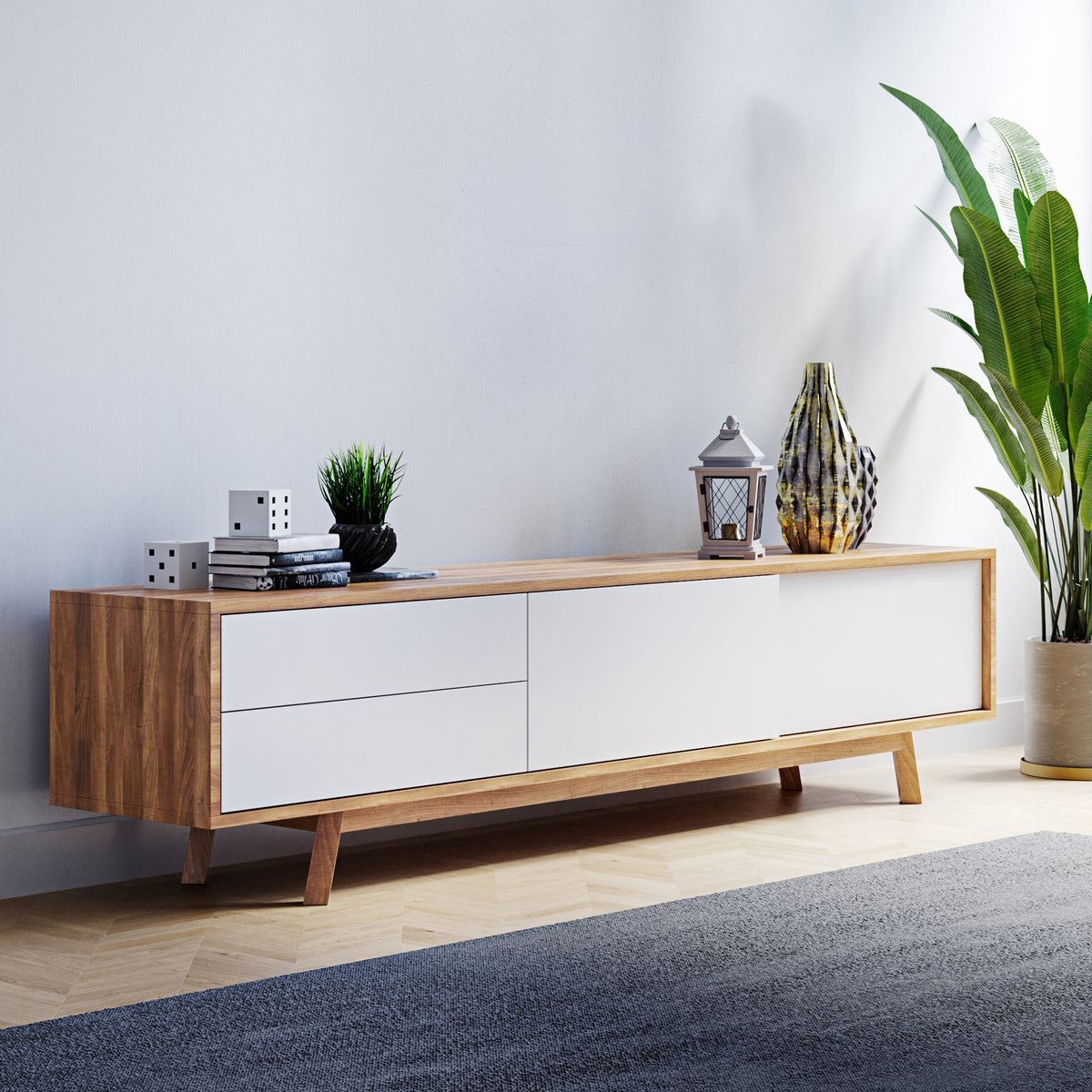 Gavyn Entertainment Unit with Cabinet and Drawers Natural/White featuring a sleek design with a large sliding cabinet, two drawers, and ample space for electronics and decor.