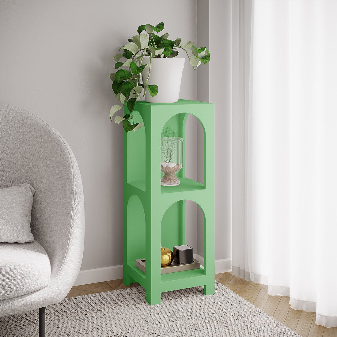 Gilbert 100cm 2 Tier Arch Storage Side Shelf in Mint Green, featuring arch-shaped openings, with a white planter on top, and decorative items on the middle and bottom shelves.