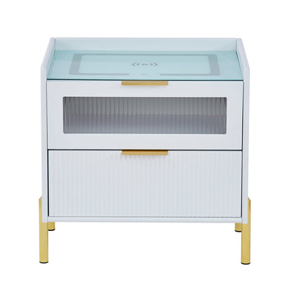 Gwen Smart Bedside Table with Wireless Charger in White, featuring two drawers with glass and ribbed fronts, gold-tone handles and legs, a glass top with Qi wireless charging pad.