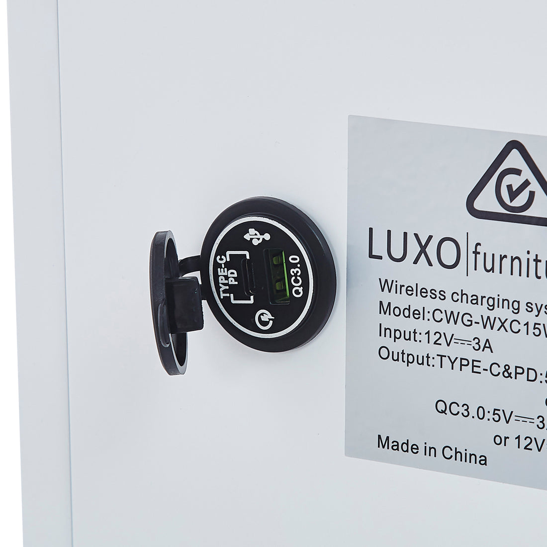 Close-up of the Gwen Smart Bedside Table with Wireless Charger in White, featuring a black USB module with USB-C and USB-A ports, and a visible model sticker.