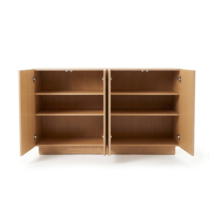 Oak sideboard with all four doors open, revealing multiple interior shelving tiers and concealed hinges against a plain white studio background