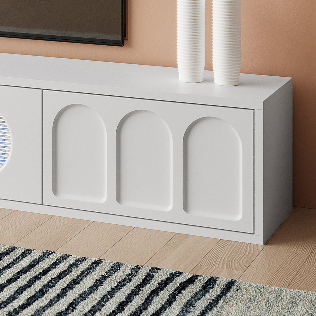 Close-up of the Hava 180cm Arched Entertainment Unit with sleek arched drawer designs and fluted glass doors, showcasing its modern storage capabilities and stylishly smooth engineered wood finish.