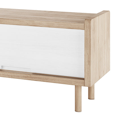 Hayden 200cm Fluted TV Entertainment Unit in Natural showcases a light oak finish with a sliding white door, cylindrical legs, and Scandinavian-inspired clean lines, offering stylish storage and modern design.