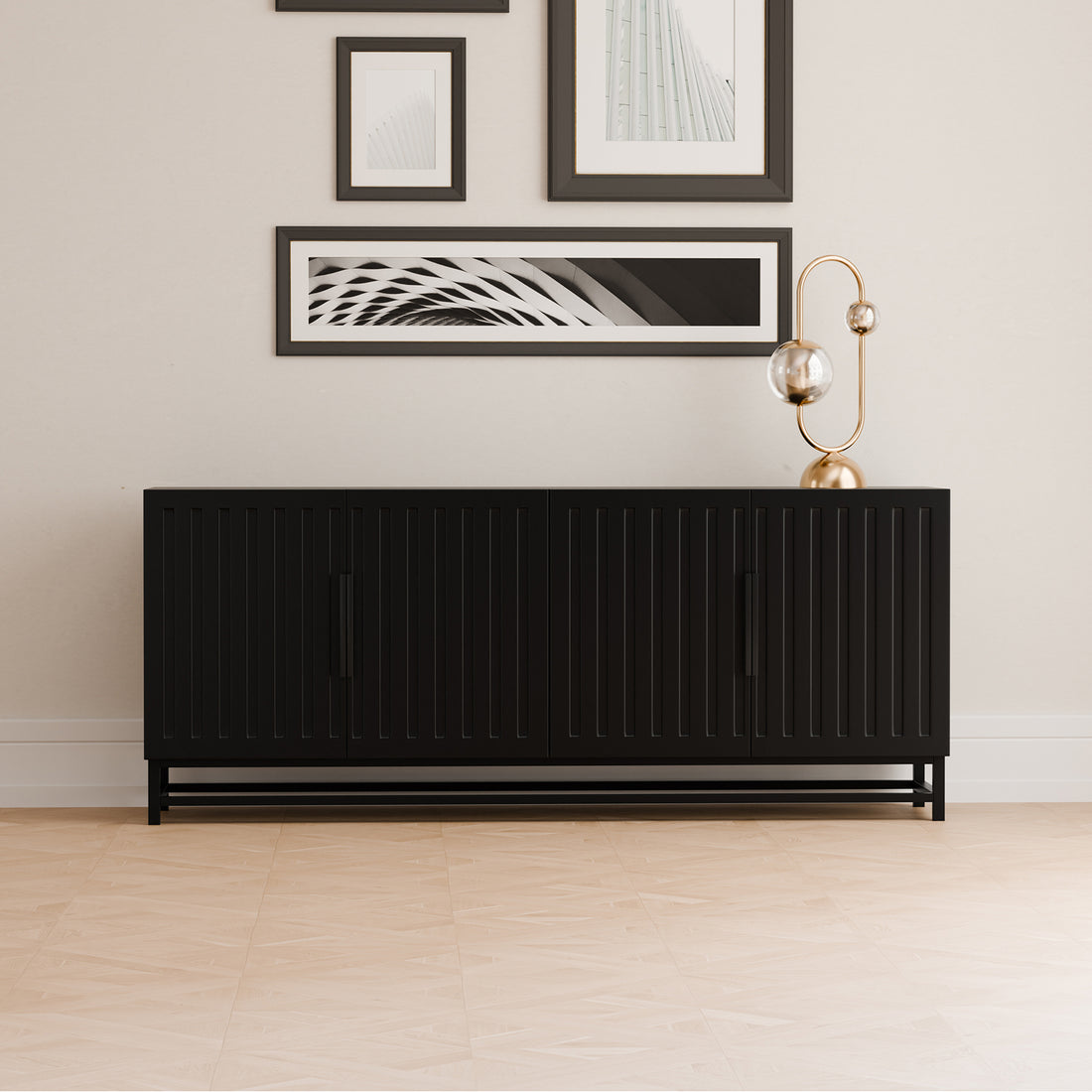 Holly 180cm 4-Door Storage Buffet Sideboard in Black, featuring vertical slatted doors and recessed handles, paired with a sculptural lamp and abstract prints, creating a sleek, modern vignette.