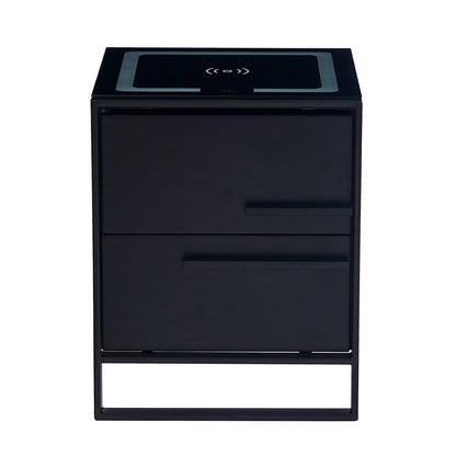 Isha Smart Bedside Table with Wireless Charger in Black, featuring a minimalist design on a slim metal frame, two drawers, and an integrated wireless-charging pad on the top surface.