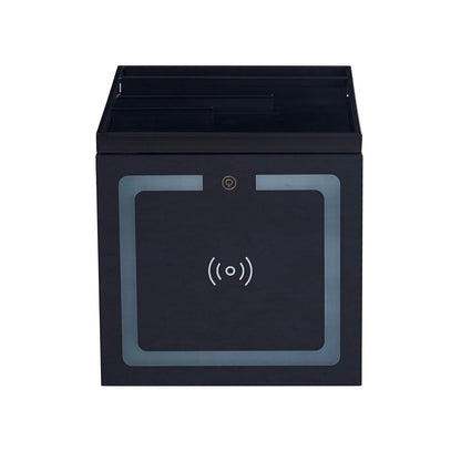 Isha Smart Bedside Table with Wireless Charger, featuring a cube design with Qi charging pad on the front, open top trays for organizing, and a universal wireless-charge icon with power button.