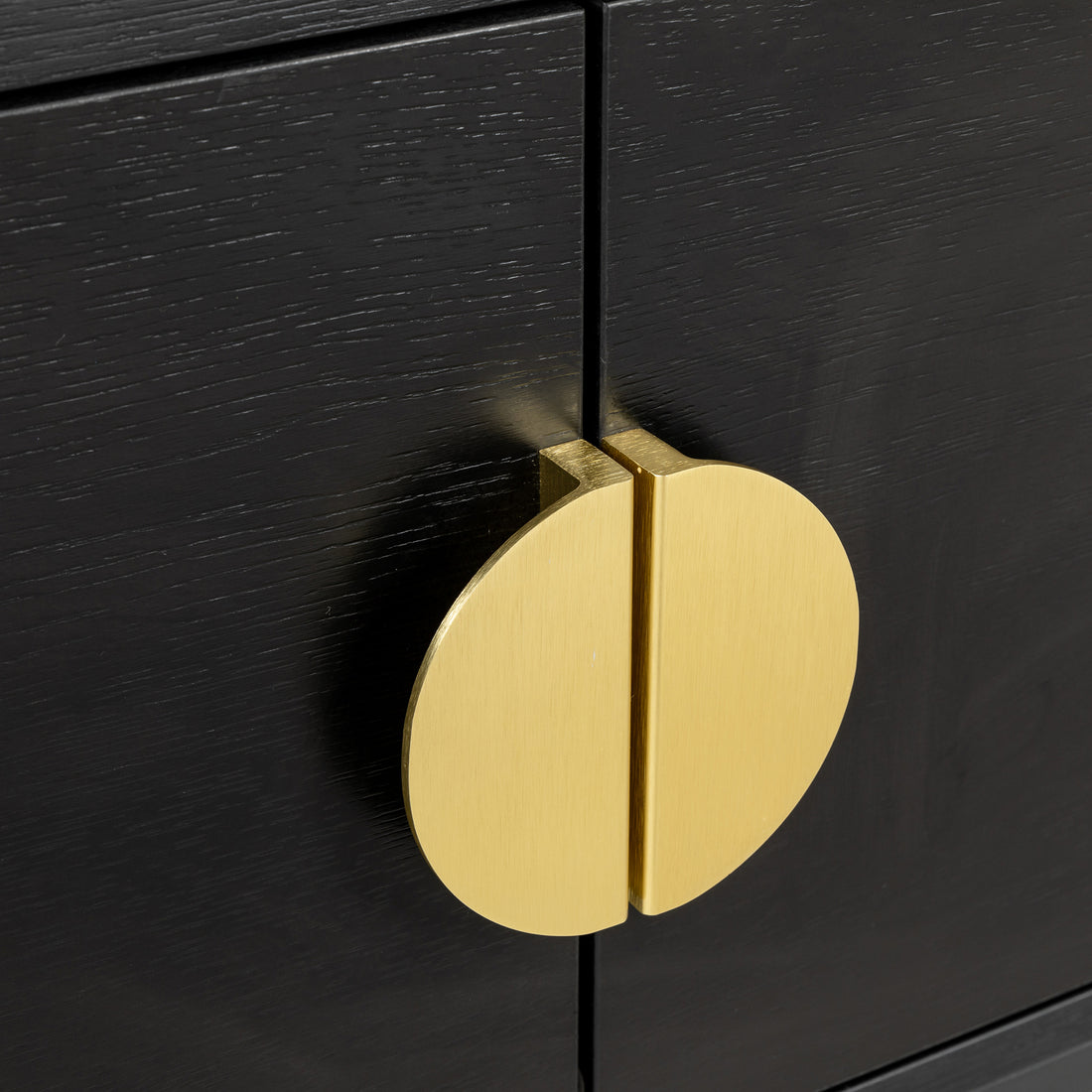 Close-up of Landon 160cm TV Entertainment Unit - Black, featuring black wood-grain cabinet doors and a circular brushed-gold metal pull, showcasing its modern and sleek design features.