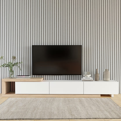Mable Extendable Entertainment Unit with Drawers White, featuring a sleek two-tone design, natural wood and white finish, under a wall-mounted TV, with greenery, books, and decorative vases arranged neatly around it.
