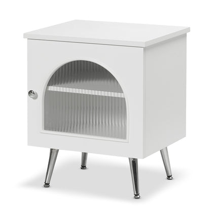 Matteau 46cm Bedside Table with Glass Door in White features a glossy finish, chrome legs, and an arched ribbed glass panel on the door, offering stylish, modern storage.